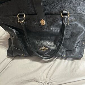 Coach Black Pebbled Leather Handbag with matching wallet.